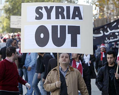 Tens of thousands of protesters gather in Beiruts Martyrs Square.