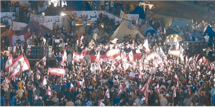 Tens of thousands of protesters gather in Beiruts Martyrs Square.