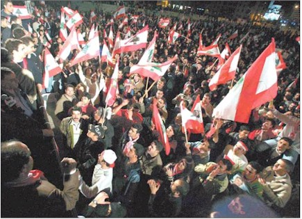 Tens of thousands of protesters gather in Beiruts Martyrs Square.