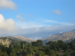 Clouds Hitting The Mountains