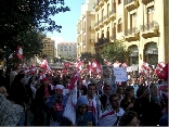 Tens of thousands of protesters gather in Beiruts Martyrs Square.