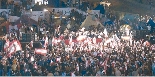 Tens of thousands of protesters gather in Beiruts Martyrs Square.